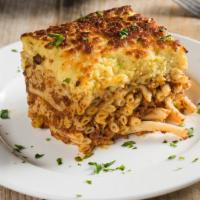 Pastichio Plate · Cousin of the moussaka, this pasta, ground beef meat, and pork based specialty is also toppe...
