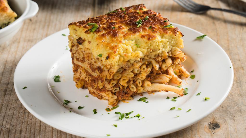 Pastichio Plate · Cousin of the moussaka, this pasta, ground beef meat, and pork based specialty is also topped with our bechamel sauce.