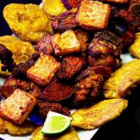 Picadera Latina · Fried pork, fried plantains, stuffed jalapeño pepper, wings, calamari, and crispy tacos.