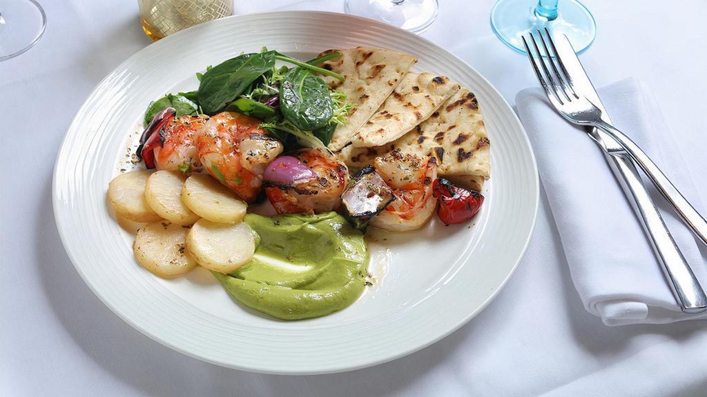 Shrimp Platter · served with tzatziki, lemon potatoes, cherry tomato salad, and grilled pita
