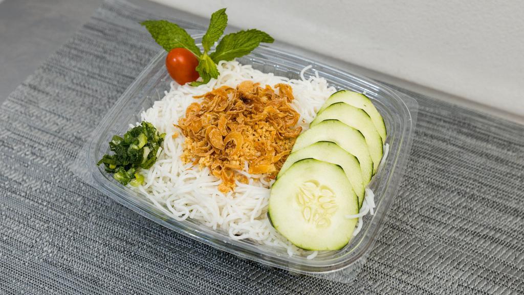 Rice Vermicelli Salad · Lettuce, cucumber, mint leaves and rice vermicelli topped with scallion oil, fried red onion and roasted peanuts. Served with Vietnamese vinaigrette sauce on the side.