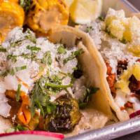 Taco - Al Pastor · Pork marinated in spices & pineapples

*All Tacos served with onions, cilantro, salsa, Cotij...