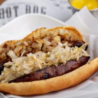 Bratwurst Dog · Deep-fried bratwurst topped with kraut and grilled onions.
