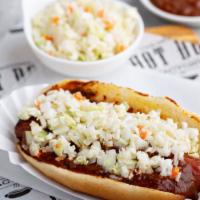 Carolina Slaw Dog · Grilled beef hot dog topped with factory chili and factory slaw.
