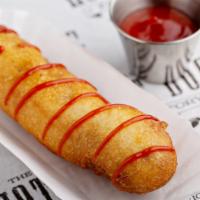 Corn Dog · Beef hot dog battered and fried and topped with mustard and ketchup.