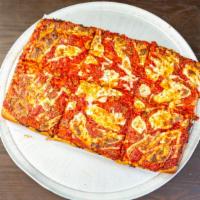 Grandma Pizza · Most Popular.  Mozzarella and Parmesan with marinara sauce and basil on top.