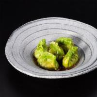 Emerald Dumplings · Either steamed or fried this vegetable dumplings are served with sweet soy sauce & perfect f...
