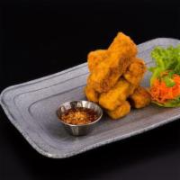 Fried Tofu · Comes with crushed peanut in our special sweet chili dipping sauce.