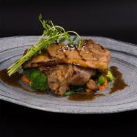 Lemongrass Pork Chop · Premium cut of pork marinated with lemongrass, sesame & served with rice & steamed vegetables.