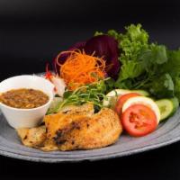 Mieng Pla · Spicy. Try your hand at wrapping up these goodies!! grilled fillet Tilapia with green lime, ...