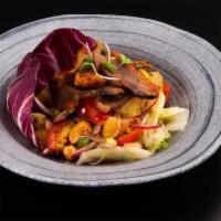 Duck Salad · Spicy. Crispy boneless duck with green apple, lettuce, cashew nuts, pineapple, red onions, &...