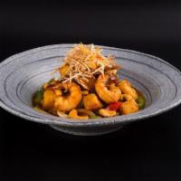 Cashew King · Spicy. Sauteed with roasted cashew nuts, onions, scallions, pineapple, bell peppers & carrots.
