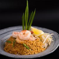 Pad Thai · Traditional Thai dish of stir-fried thin rice noodles with egg, bean sprouts, scallions & cr...