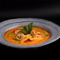 Red Curry · Spicy. Stop! and get this! bell peppers, bamboo shoots & basil leaves simmered in coconut mi...