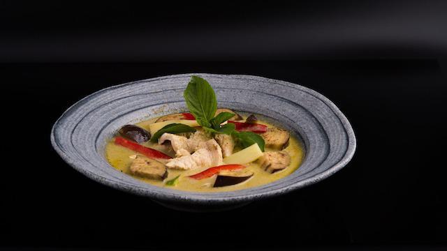 Green Curry · Spicy. Go! and have this too! eggplant, bamboo shoots, bell peppers & fresh basil leaves, partying in a broth of coconut milk with green chili paste, blended with Thai herbs & spices.