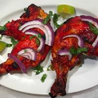 Tandoori Chicken · Spicy. Skewered chicken on the bone from our tandoor.