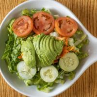 Ensalada De Aguacate · Avocado salad. Sliced avocado, tomatoes, lettuce, mixed vegetables and house dressing.