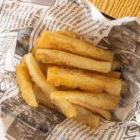 Yuca A La Huancaina · Fried yuca with yellow Peruvian sauce.