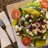 Traditional Greek Salad · Fresh cut lettuce, tomatoes, red onion, pepperoncinis, feta, kalamata olives, green peppers ...