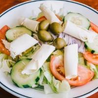 Garden Salad With Chicken · Grilled chicken over tomatoes, cucumbers, onions, green peppers, olives, and an egg.