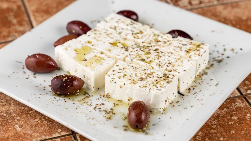 Feta Cheese · Come with Kalamata olives, extra virgin olive oil, and oregano. Served with hot pita bread.