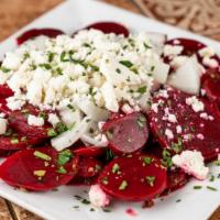 Fresh Red Beets  · Extra virgin olive oil, red wine vinegar, onions, and hummus. Served with hot pita bread.