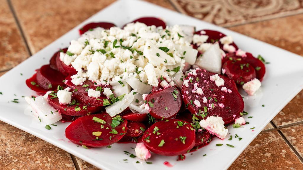 Fresh Red Beets  · Extra virgin olive oil, red wine vinegar, onions, and hummus. Served with hot pita bread.