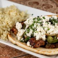 Loukaniko Platter · Homemade Greek sausage garnished with fried onions/peppers, feta.