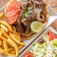 Gyro Platter · Served with Greek salad, pita bread, tzatziki sauce, garnished with tomato, onions, and cucu...