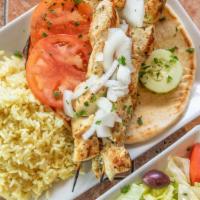 Chicken Kebab Platter · Two skewers marinated and chargrilled. Served with Greek salad, pita bread, tzatziki sauce, ...