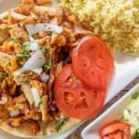 Chicken Gyro Platter · Served with Greek salad, pita bread, tzatziki sauce, garnished with tomato, onions, and cucu...