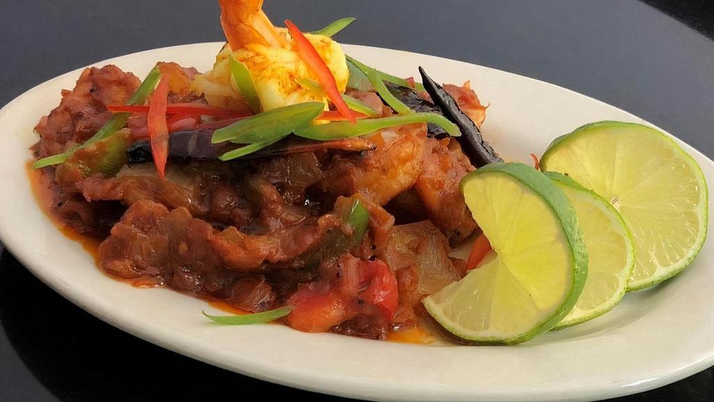 Shrimp Balchao · A classic Goan street food! Succulent shrimp in a spicy chili masala sauce. with star anise.