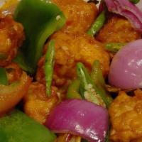 Chilli Chicken · Tender cubes of chicken cooked in a spicy soya sauce with onions and. green peppers.