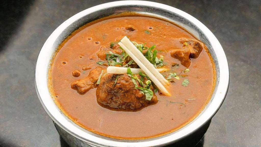 Aag Gosht - Entree · Goat cooked with khada masalas in an onion based . gravy with coriander, cinnamon, clove and chillies.