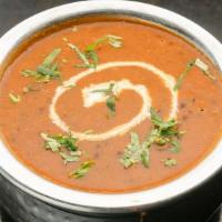 Dal Makhni - Entree · Black lentils cooked overnight, on a seasoned with fresh herbs.
