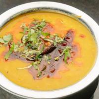 Dal Tarka - Entree · Freshly made yellow lentils with garlic, onions and spices - a house specialty!