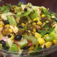 Southwest Chicken Salad · Diced chicken, corn, black beans, grape tomatoes, red onions, celery, romaine, and sunflower...