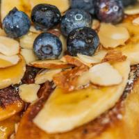 Bb French Toast  (Til 4Pm · Ciabatta french toast mixed w banana, blueberry or strawberry and topped w shaved almonds & ...