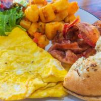 Breakfast Of Champions Platter · 3 eggs, protein (sausage, ham, or bacon), home fries, toasted bialy w butter