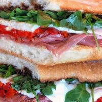 Lucky Luciano · Prosciutto di Parma, mozz, roasted peppers, olive oil, balsamic glaze