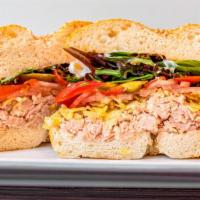 Spicy Tuna · Genova tuna in olive oil, crushed bbq chips, cherry peppers, tomato, mesclun, mayo