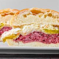 Scotto Special · Hot pastrami, melted pepper jack, bread & butter pickles, slaw, dijon mustard