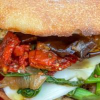 Veggie King · Broccoli rabe, sun-dried tomato, grilled eggplant, provolone, caramelized onions, olive oil,...