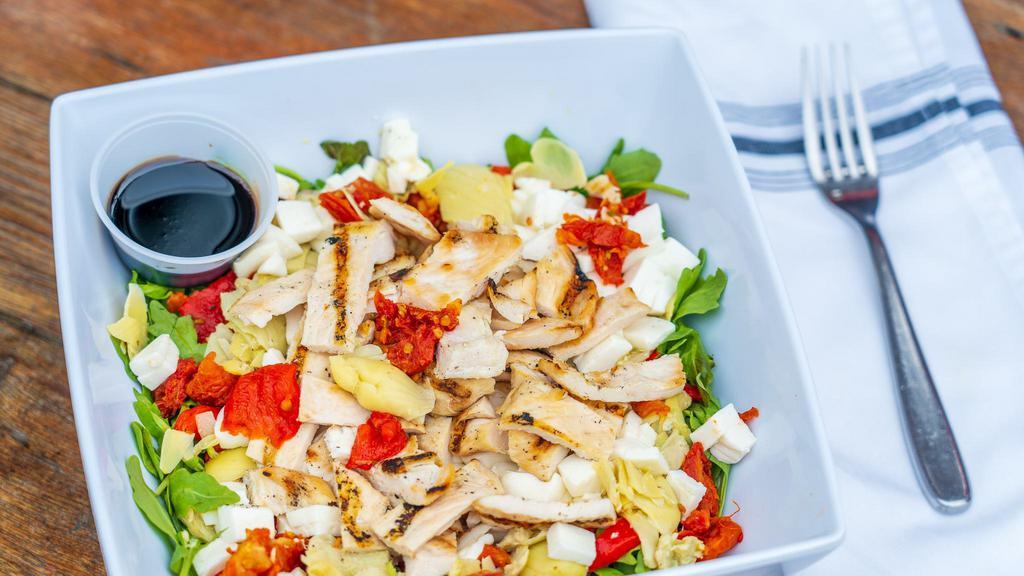 Grilled Chicken Balsamic · Marinated grilled chicken, mozz, sun-dried tomato, artichoke, roasted peppers, mesclun, olive oil, balsamic vinaigrette