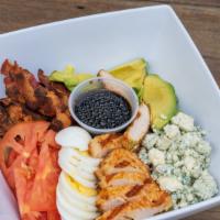 Cobb Salad · Iceberg lettuce, goat cheese, bacon, grilled chicken, hard boiled eggs, avocado, tomato, but...