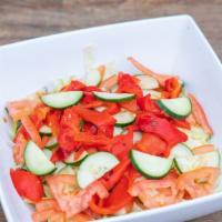Bb Garden Salad · Iceberg lettuce, cucumbers, tomatoes, roasted red peppers, olive oil, red wine vinegar