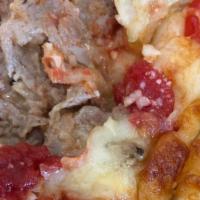Meat Lover Pizza · -a meat lovers delight, our pizza topped with 5 meats including: Smoked Ham, Ground Beef Pep...