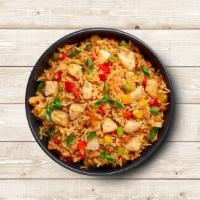 Chicken Dragon Fried Rice · Long grain aromatic rice wok tossed with chicken, fresh mixed vegetables, and Indo-Chinese s...