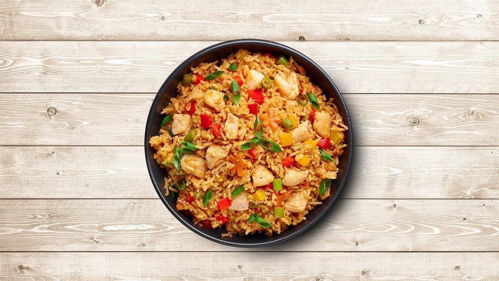 Chicken Dragon Fried Rice · Long grain aromatic rice wok tossed with chicken, fresh mixed vegetables, and Indo-Chinese sauces.