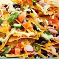 Nacho Mama'S · Tortilla chips topped with your meat choice, vegetarian options available, homemade beans, l...